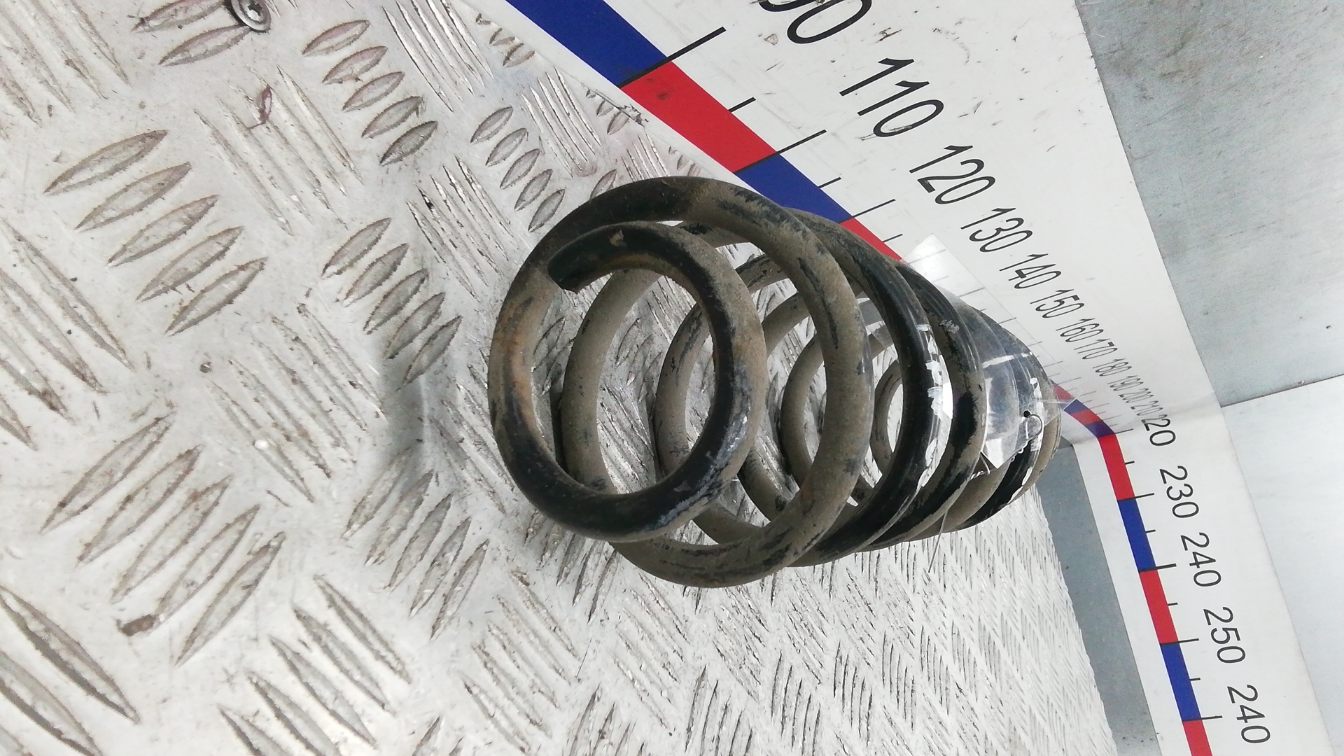 Пружина задняя