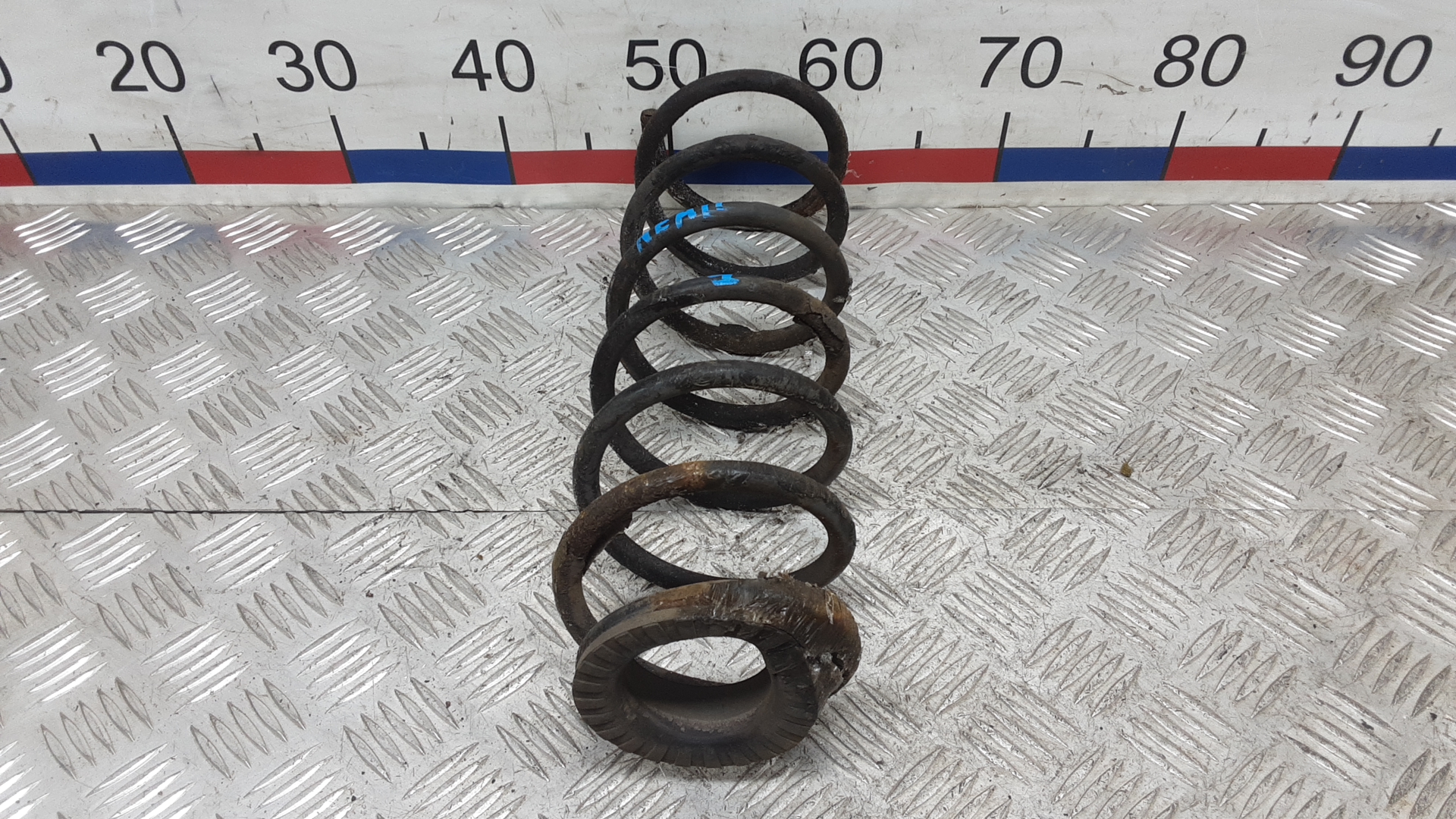 Пружина задняя