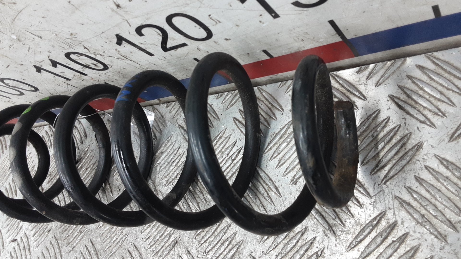 Пружина задняя