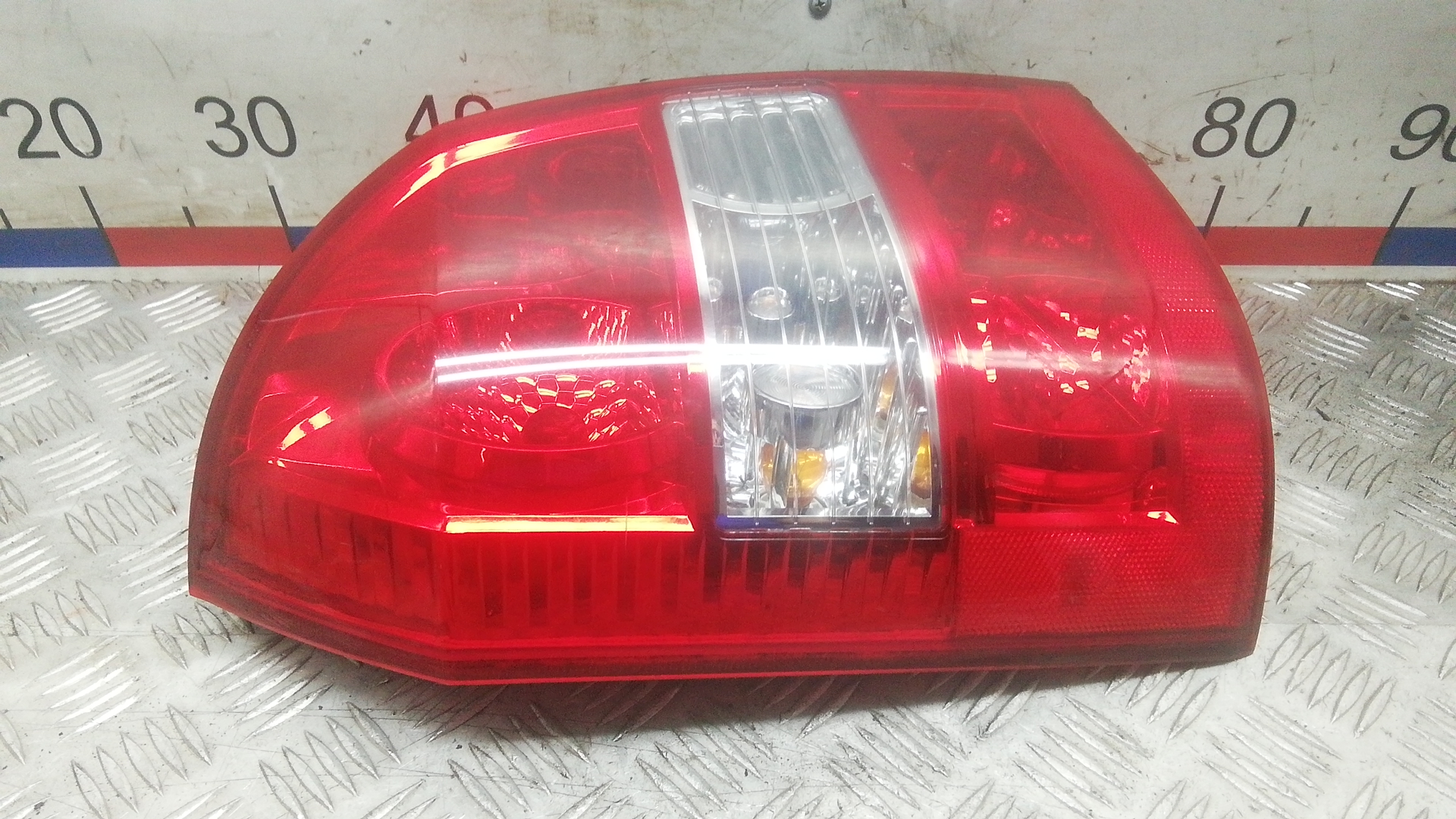 Фонарь задний левый