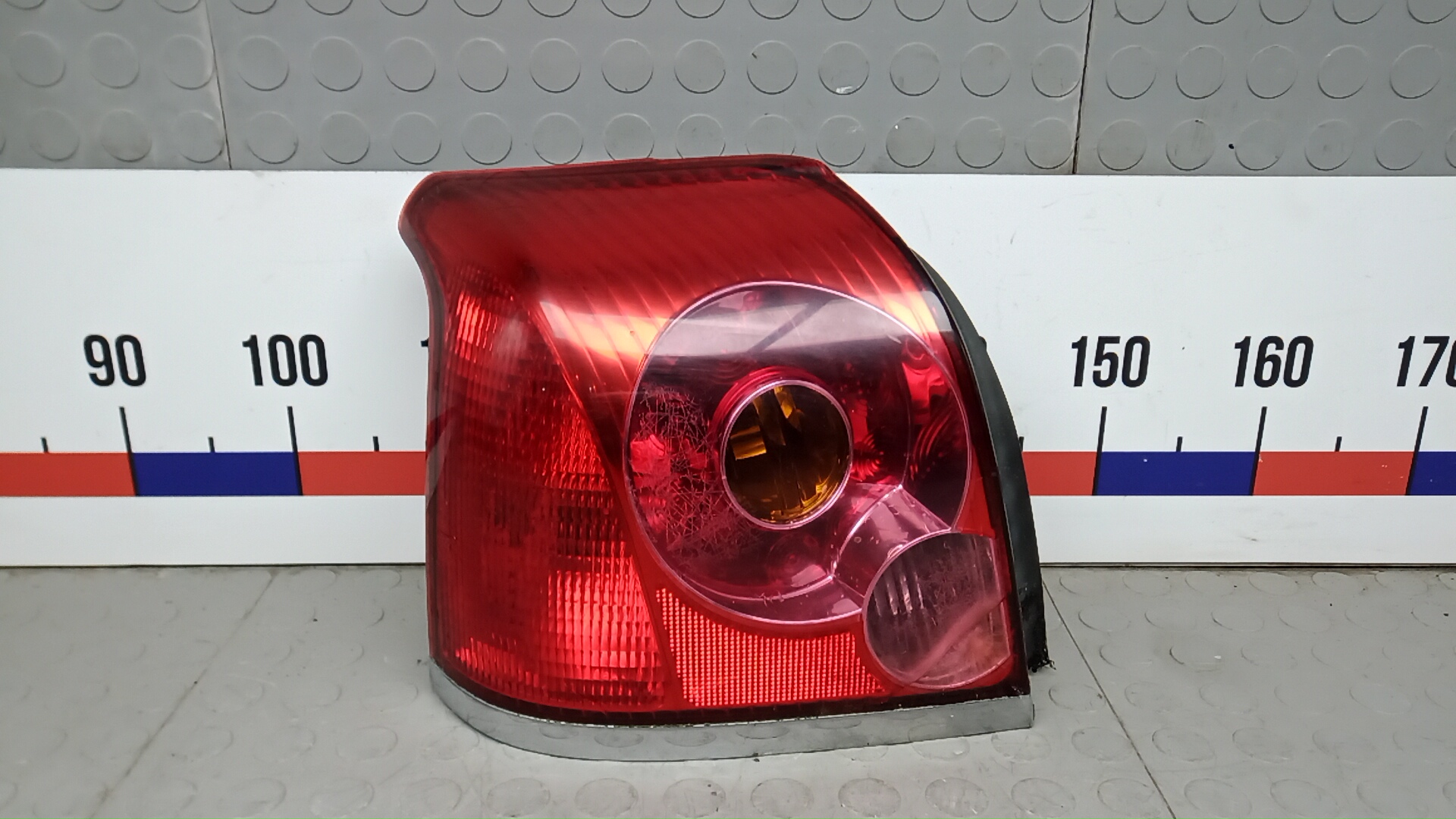 Фонарь задний левый