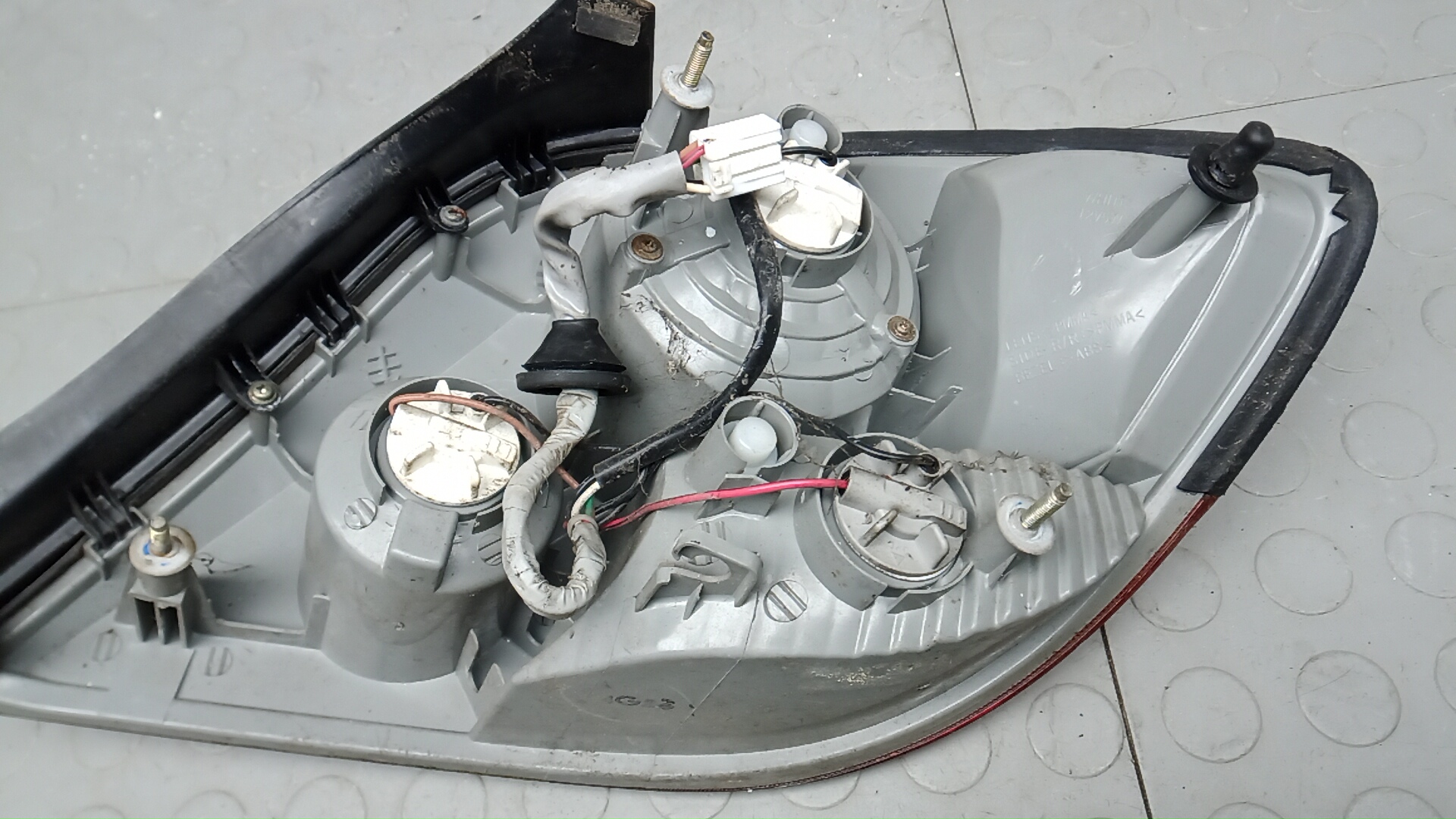 Фонарь задний левый