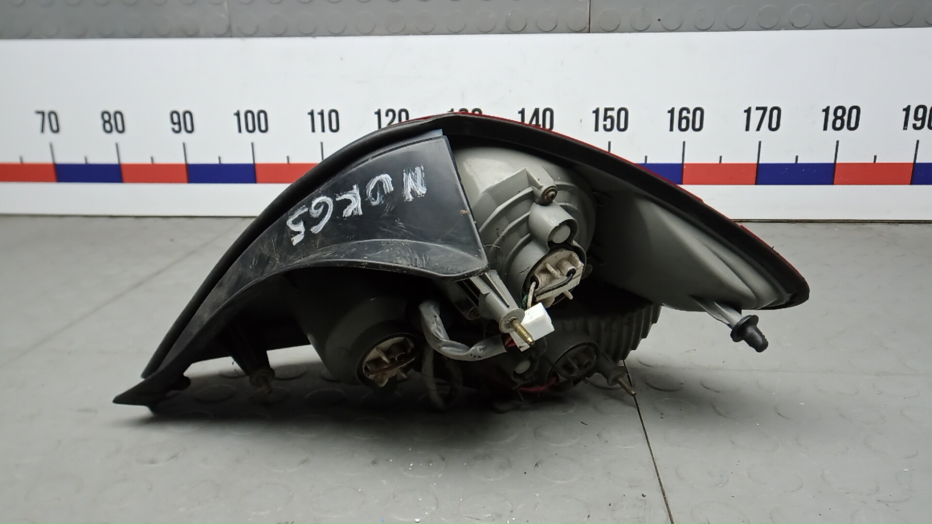 Фонарь задний левый