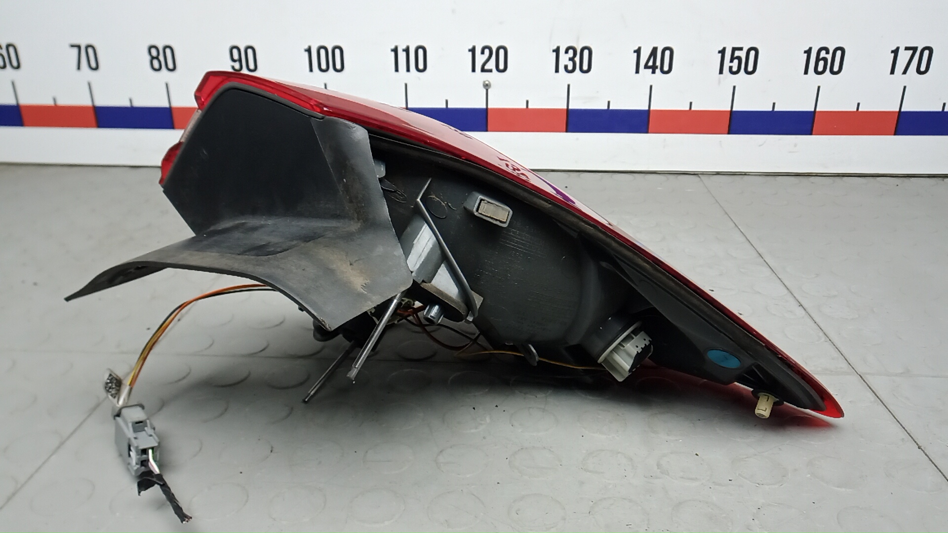 Фонарь задний левый