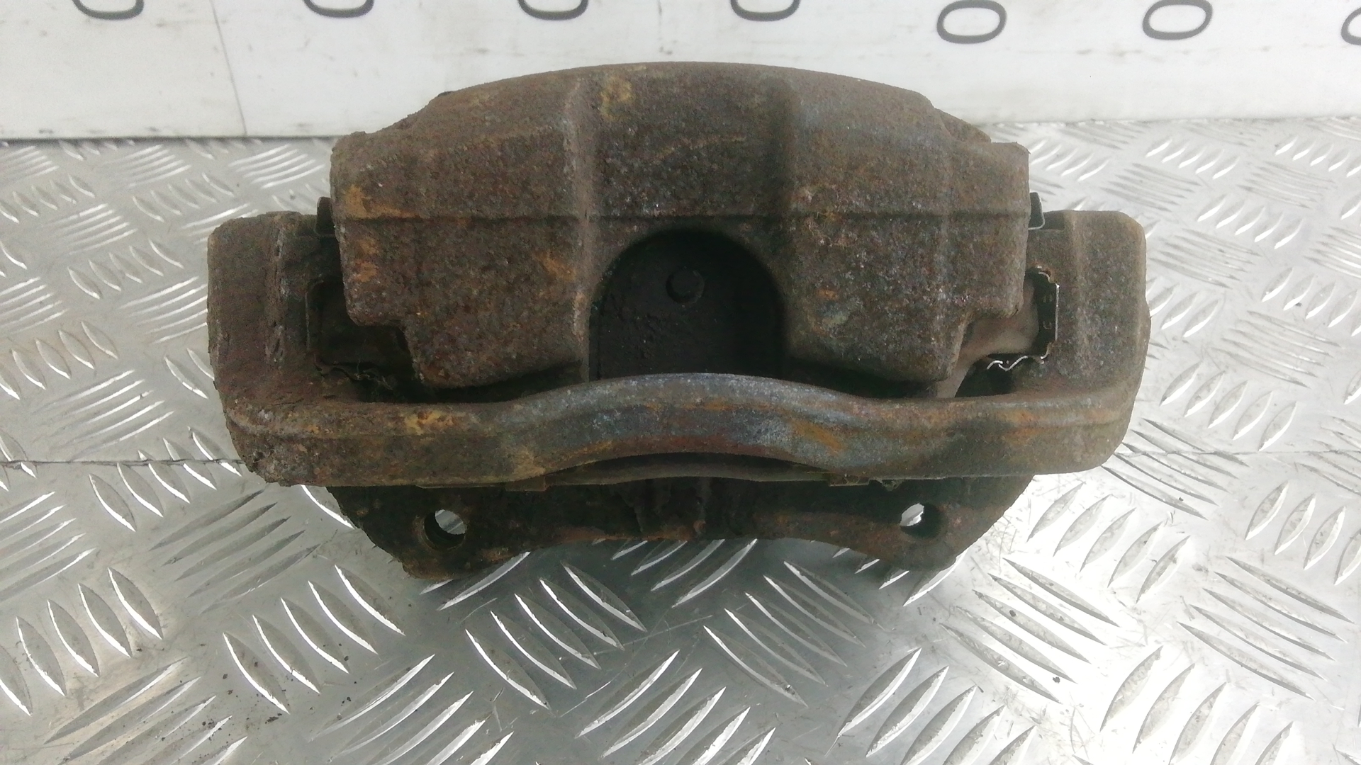 Суппорт передний левый