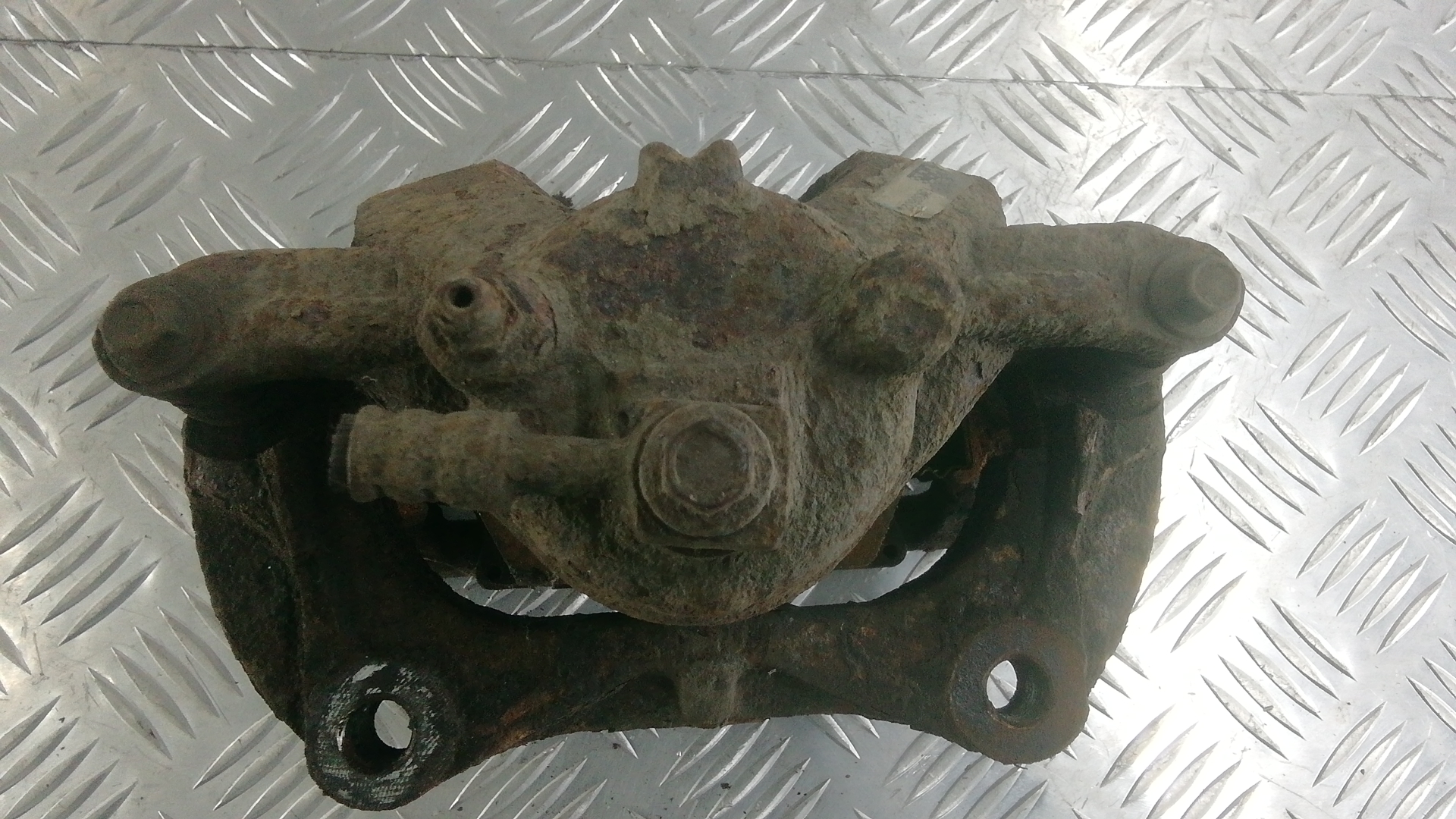 Суппорт передний левый