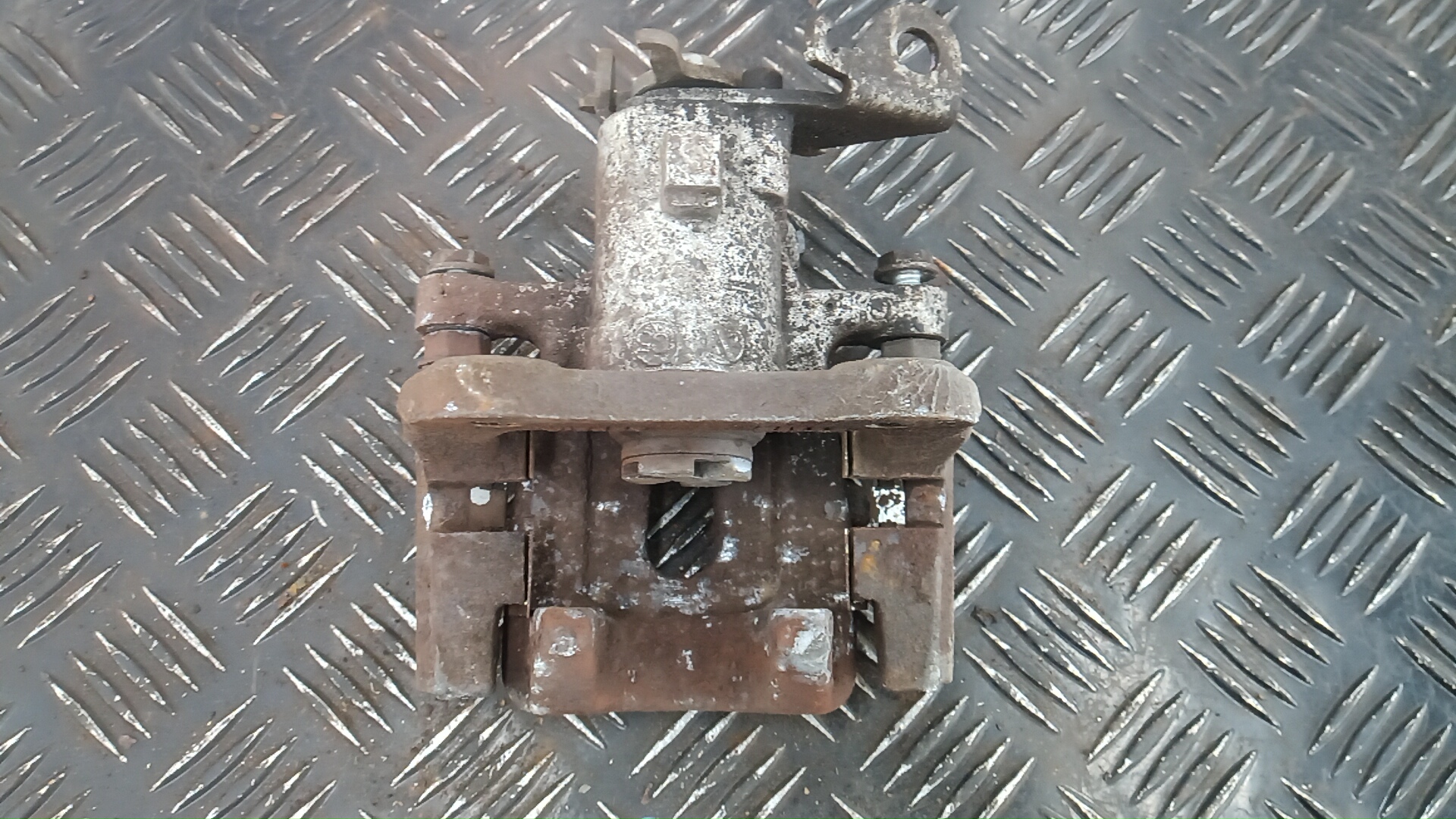 Суппорт задний левый