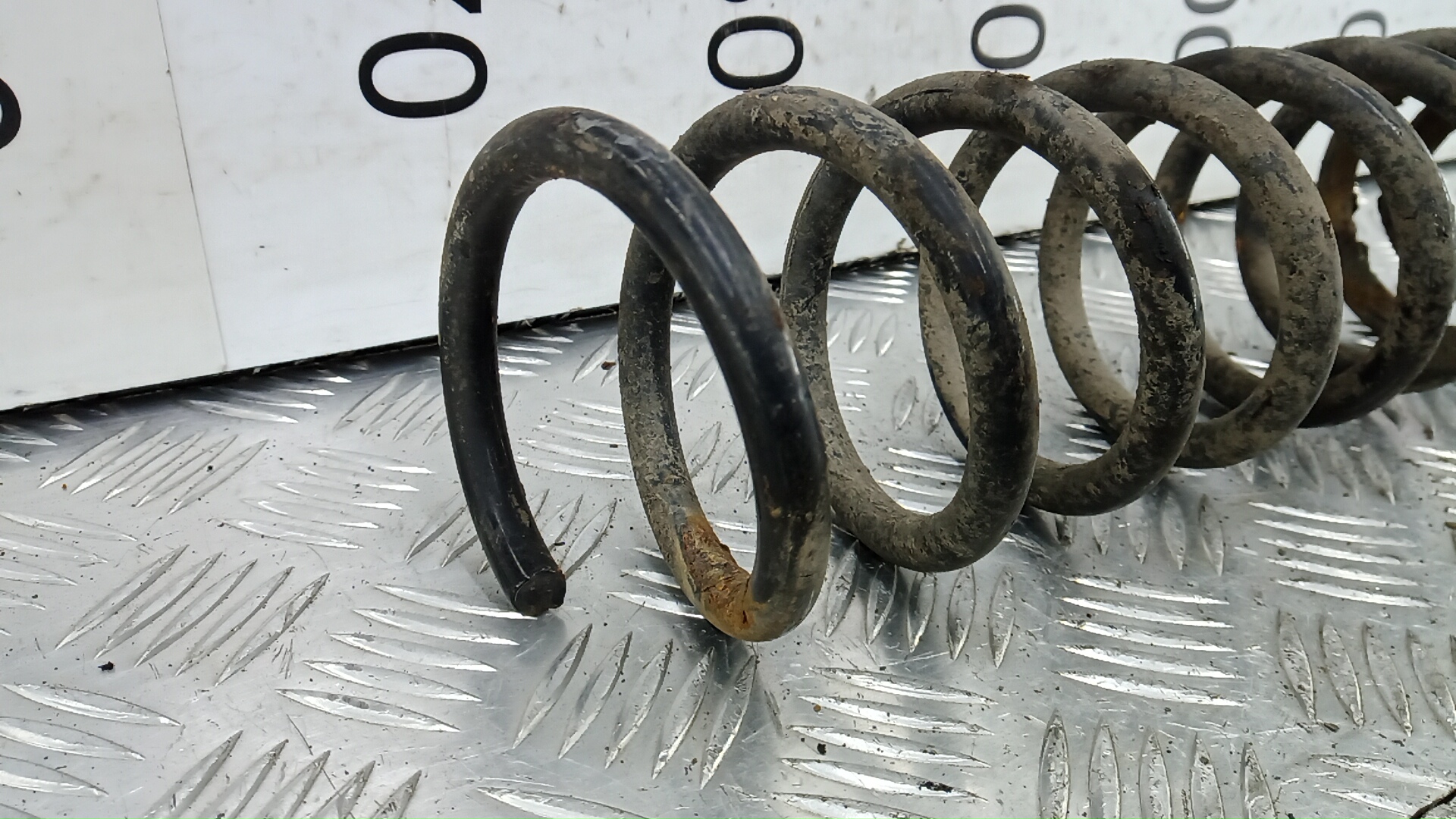 Пружина задняя