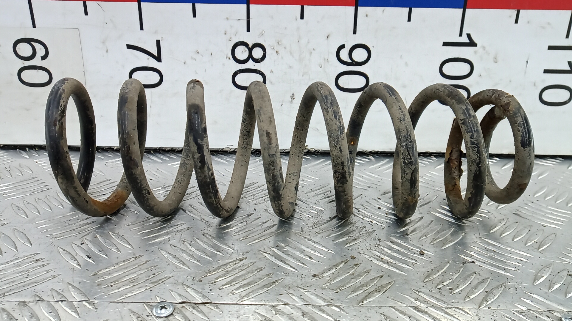 Пружина задняя