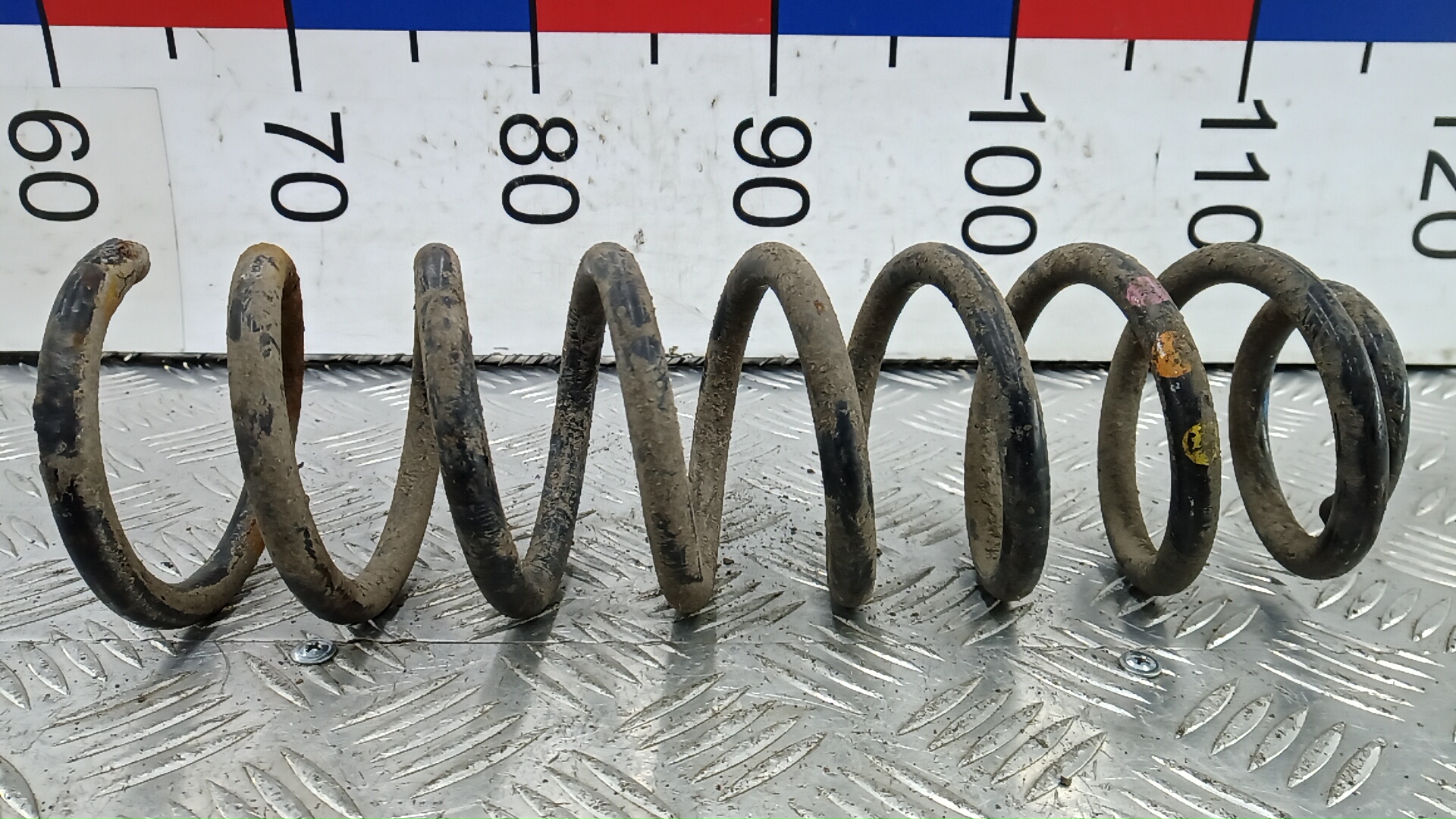 Пружина задняя