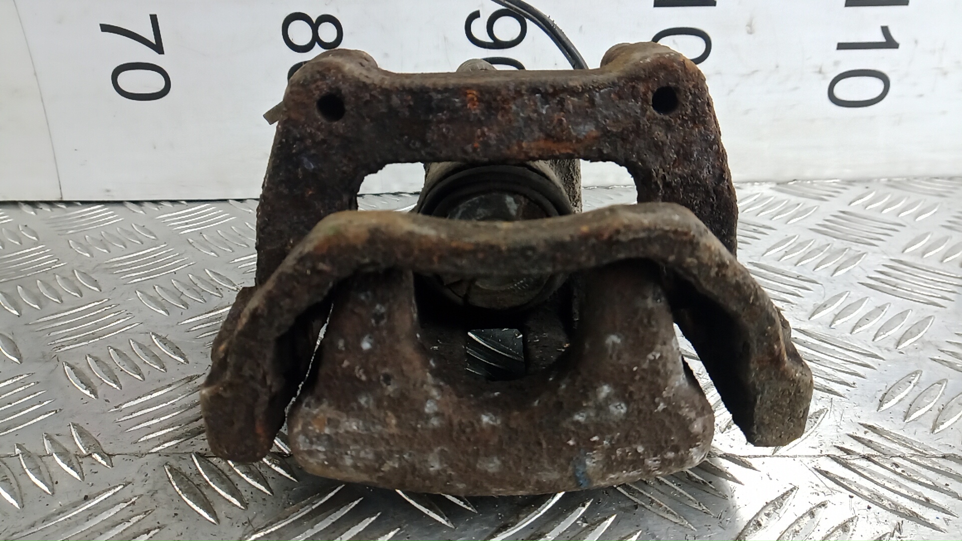 Суппорт задний левый