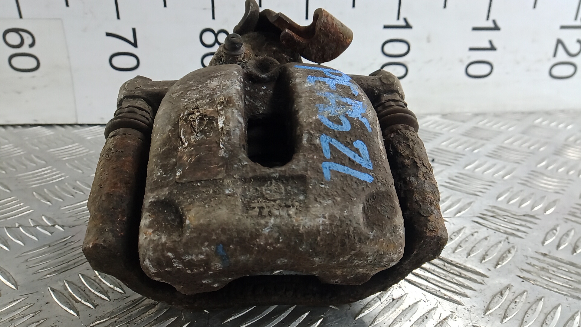 Суппорт задний левый