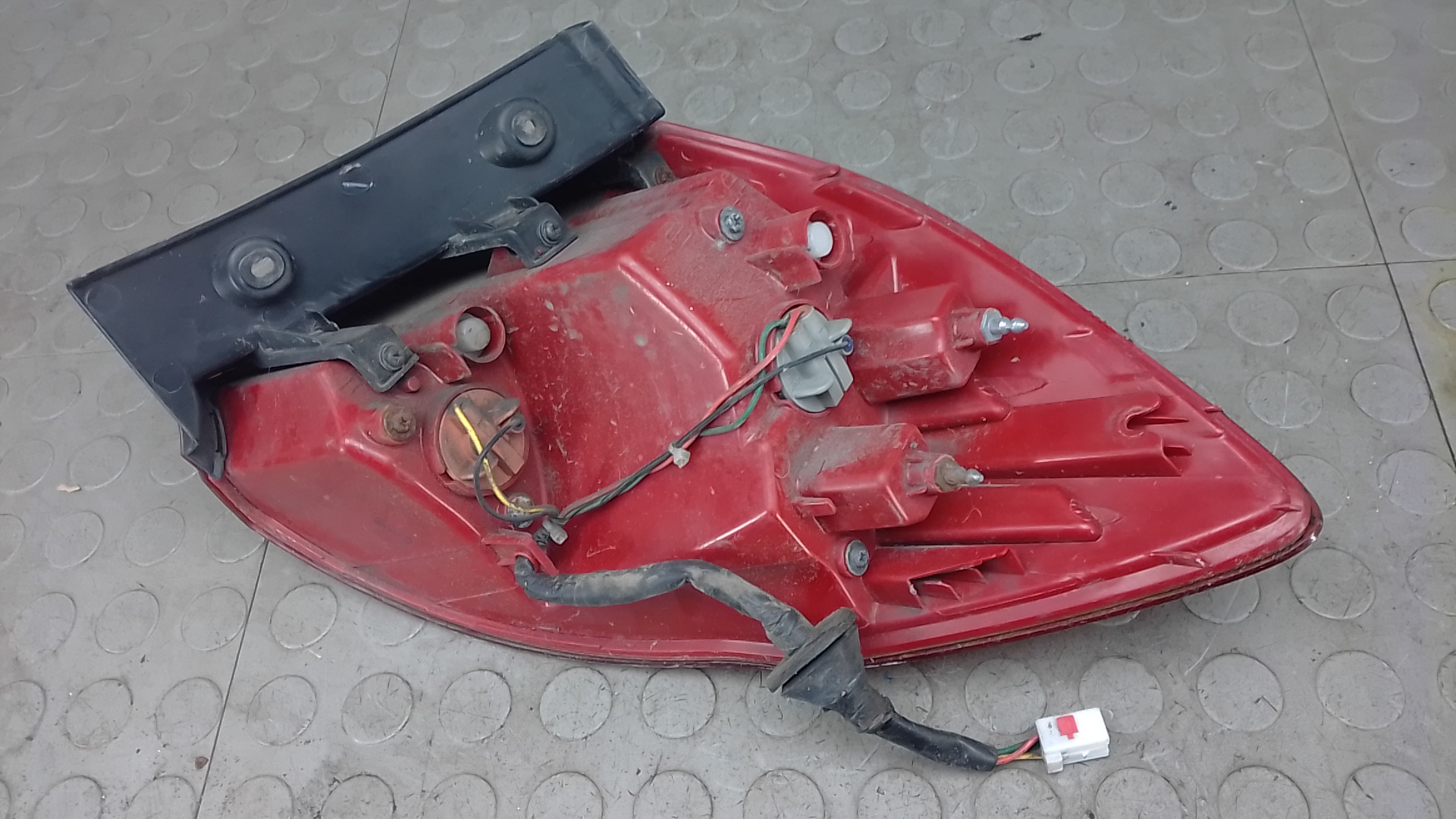 Фонарь задний левый