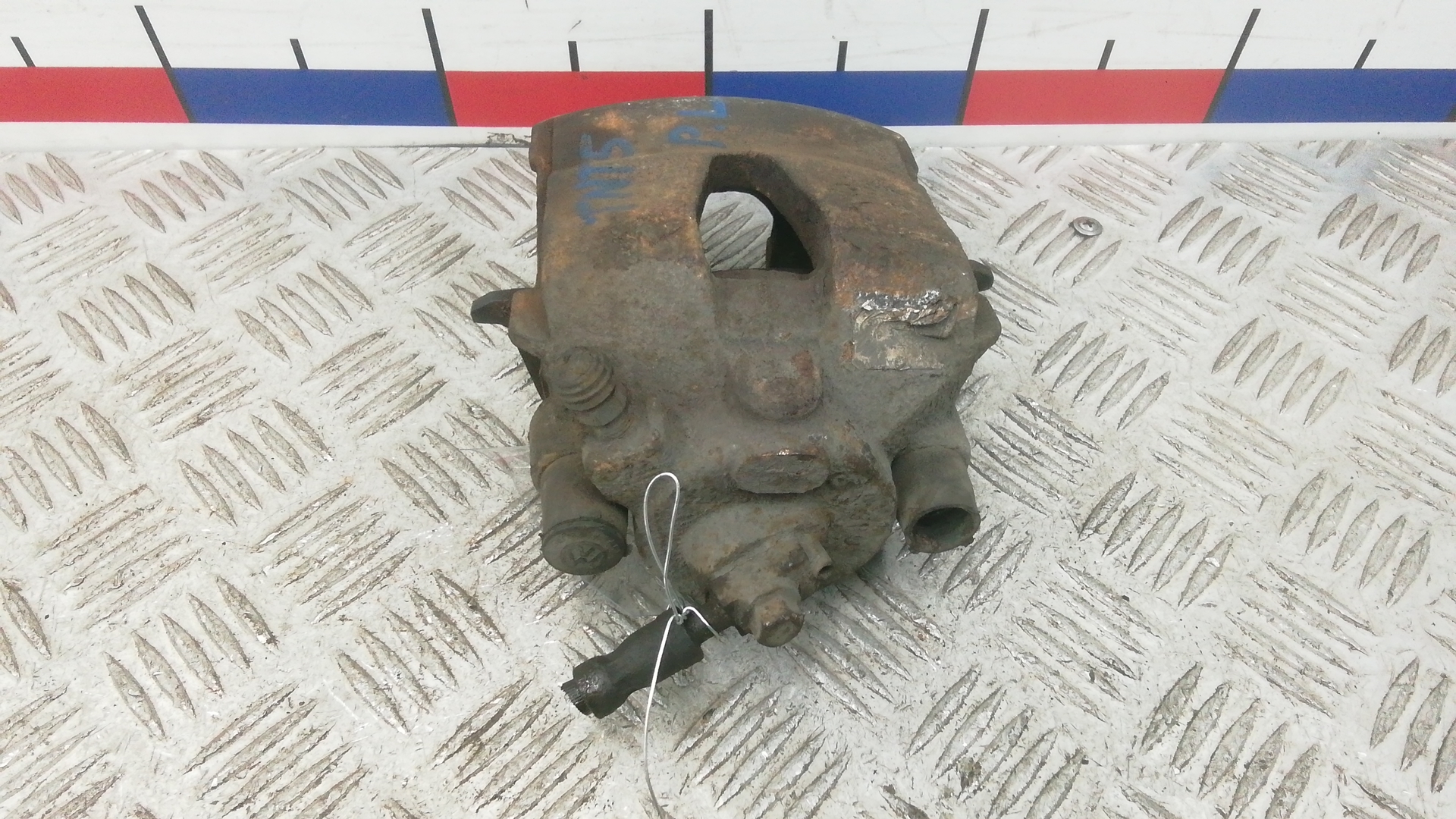 Суппорт передний левый