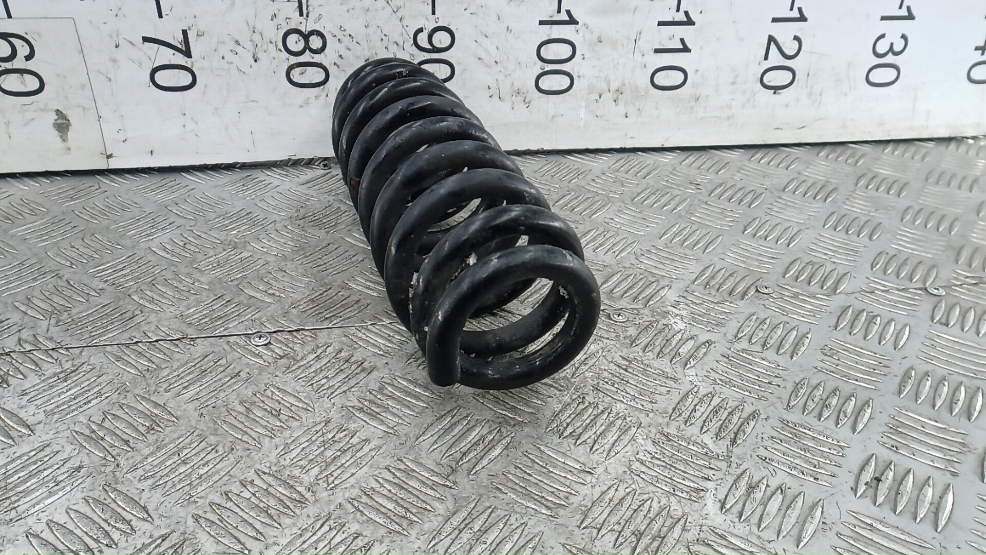 Пружина задняя