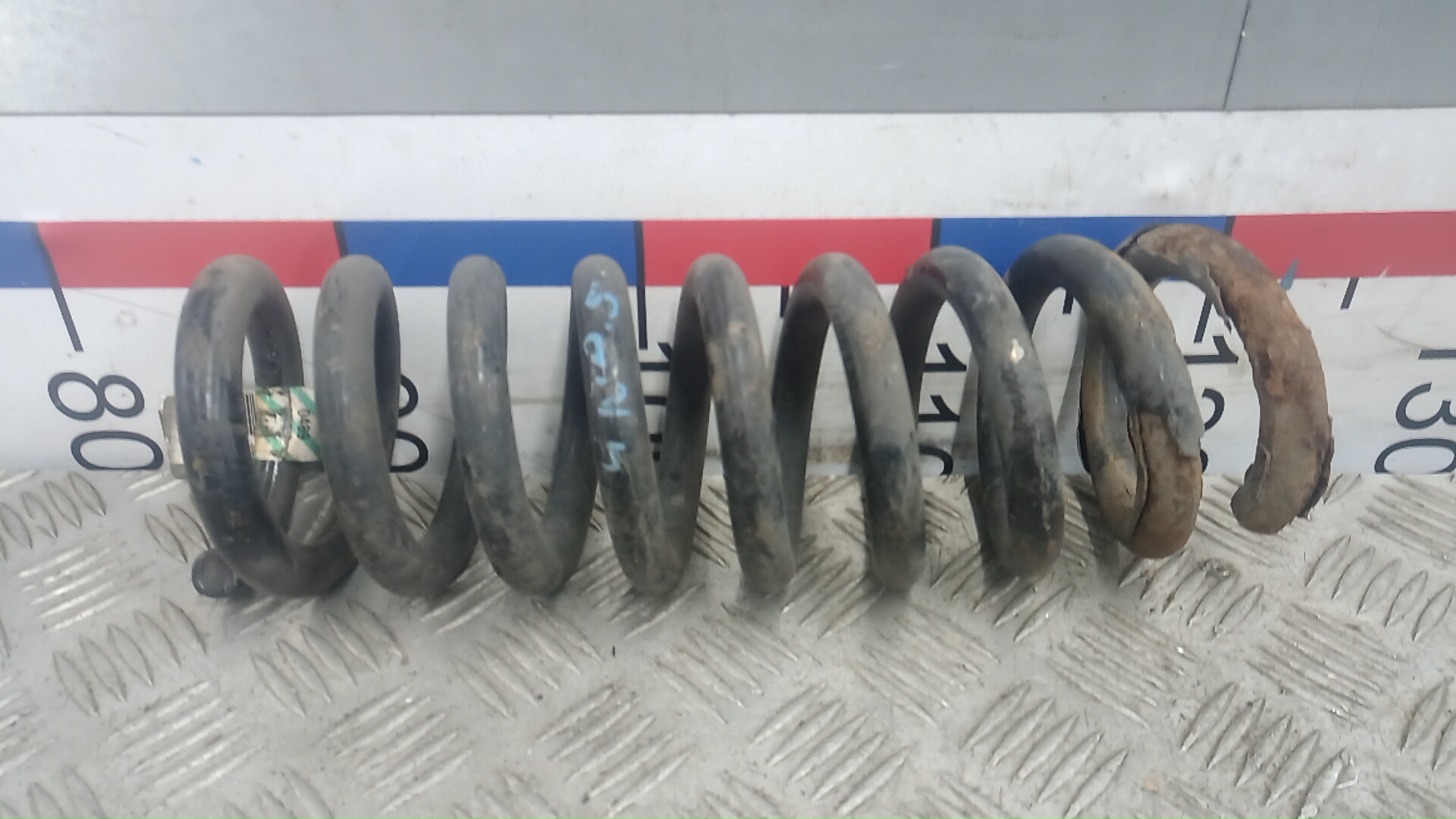 Пружина задняя