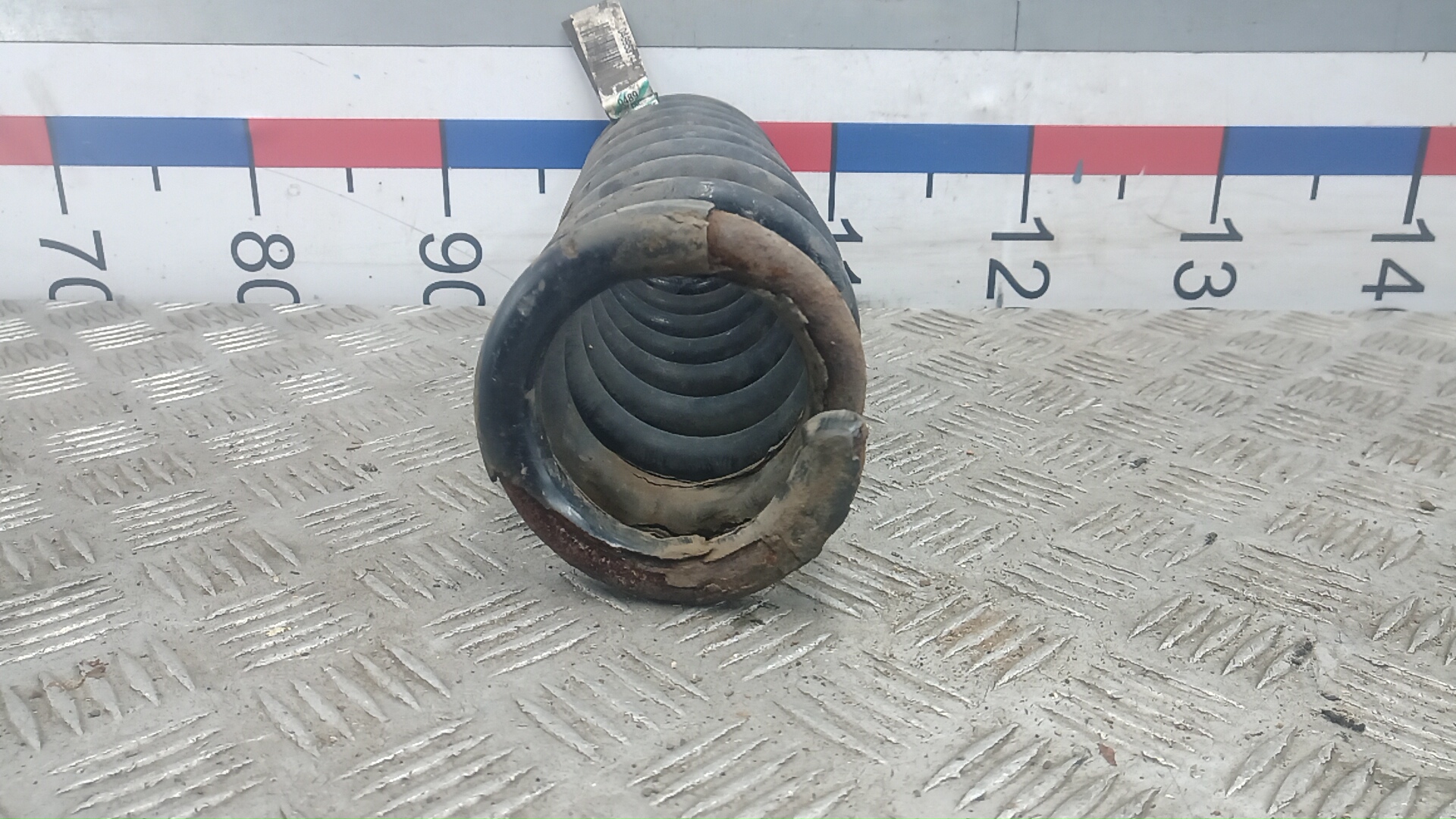 Пружина задняя