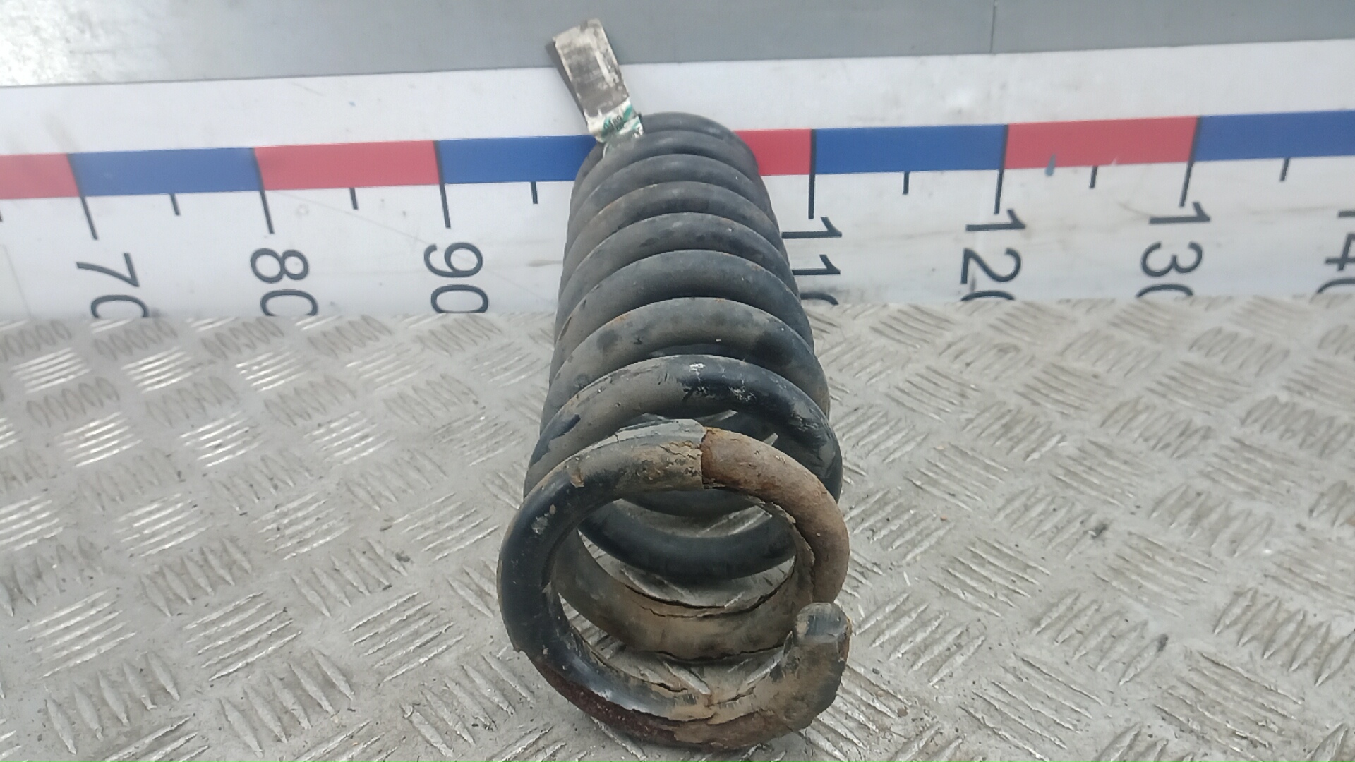 Пружина задняя