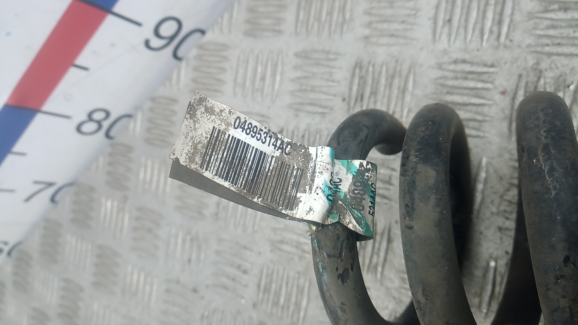 Пружина задняя