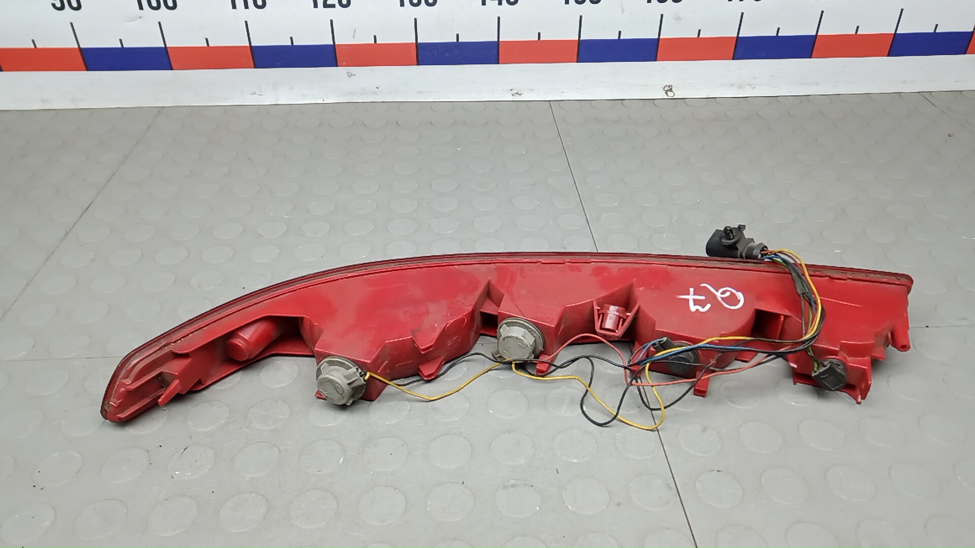 Фонарь задний в бампер левый