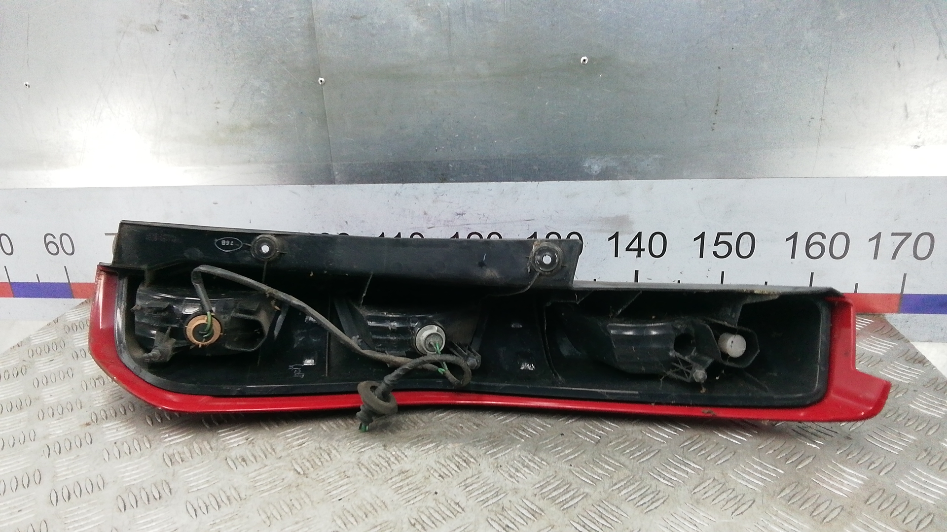 Фонарь задний левый