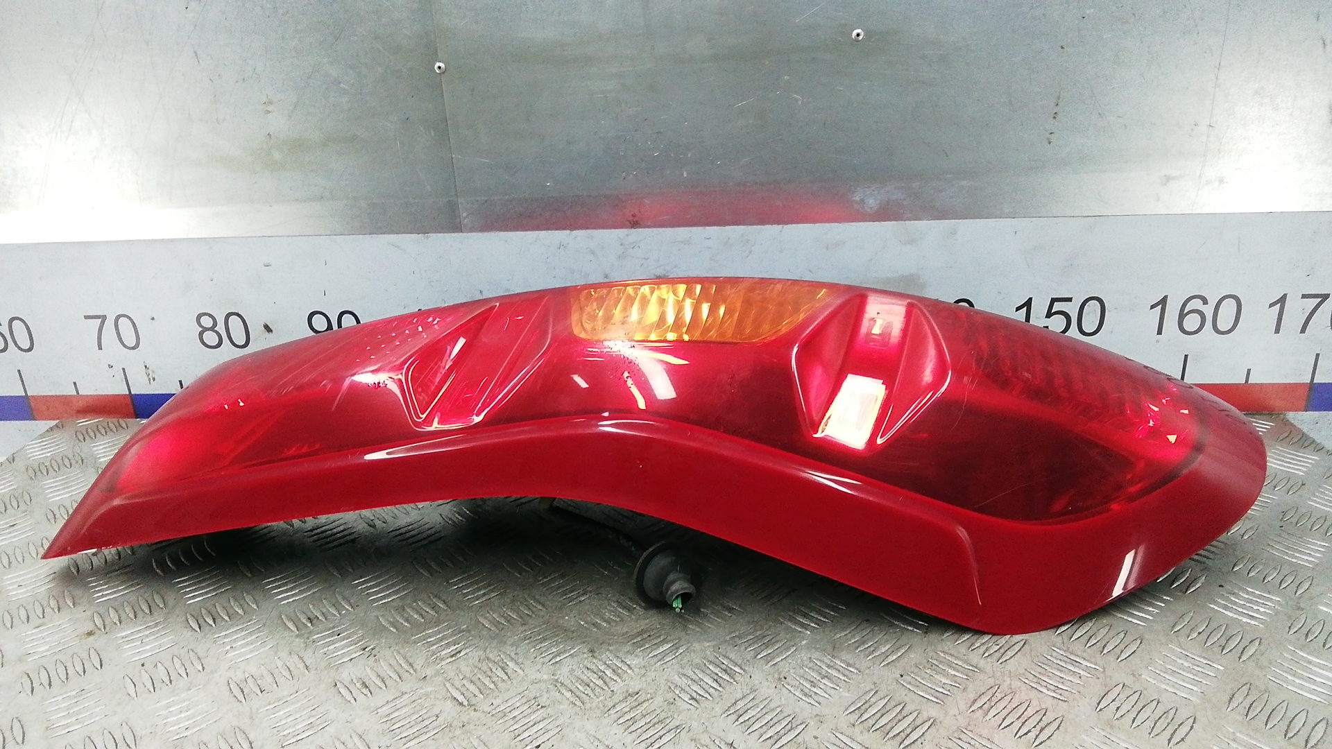 Фонарь задний левый