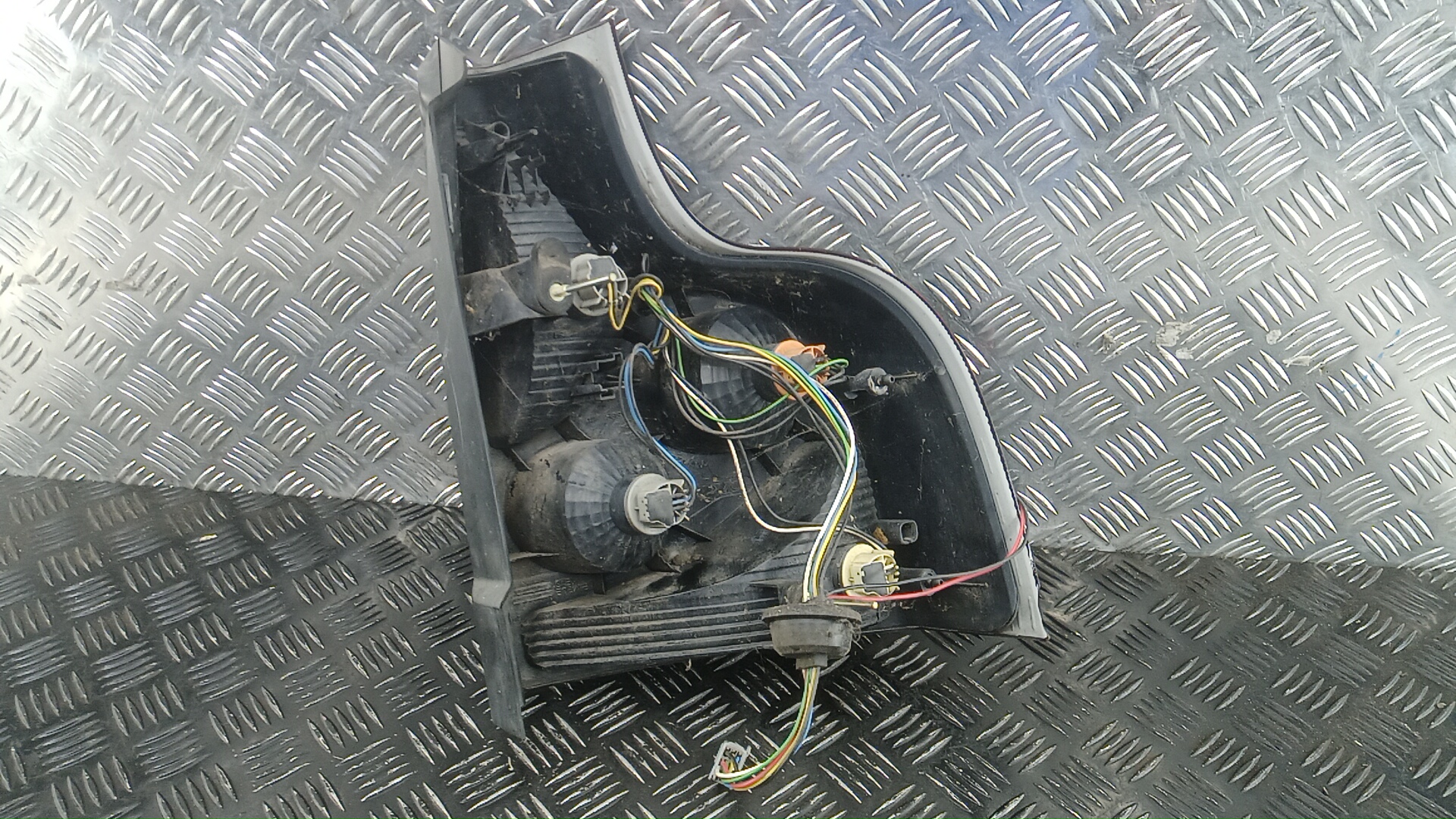 Фонарь задний левый