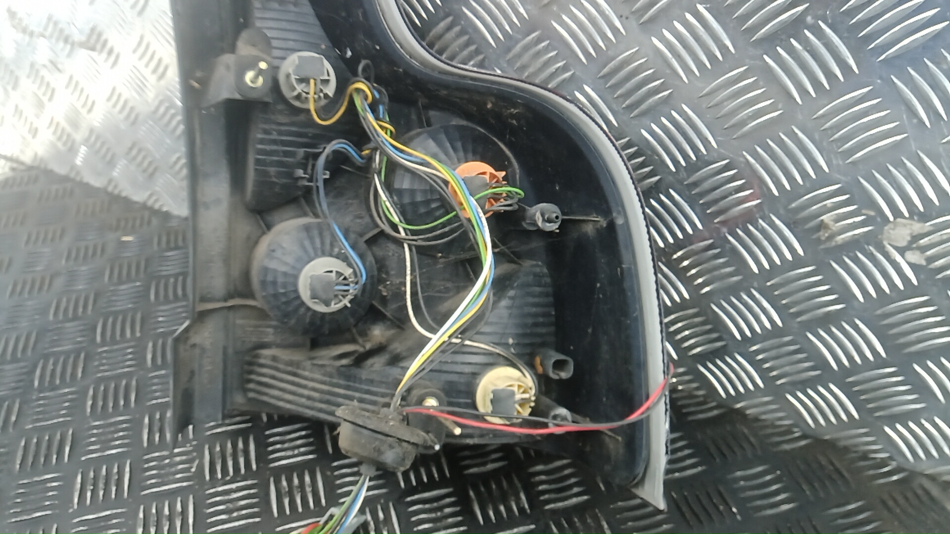 Фонарь задний левый