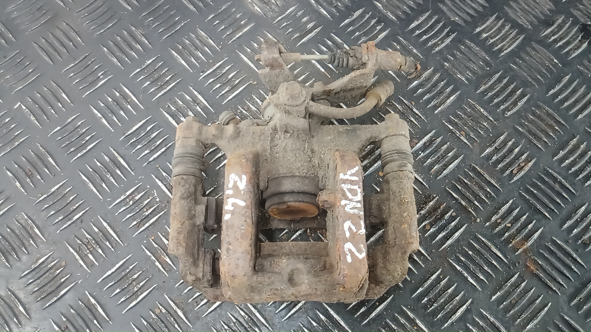 Суппорт задний левый