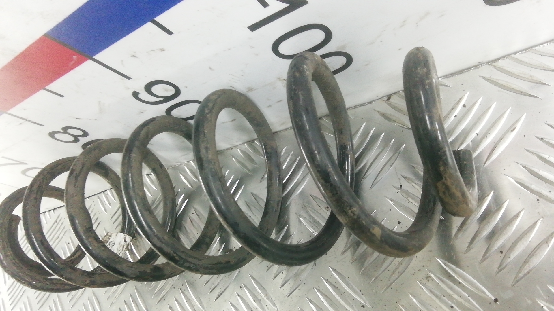 Пружина задняя