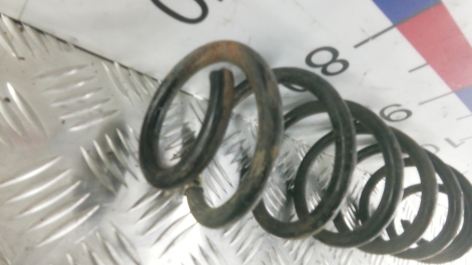 Пружина задняя