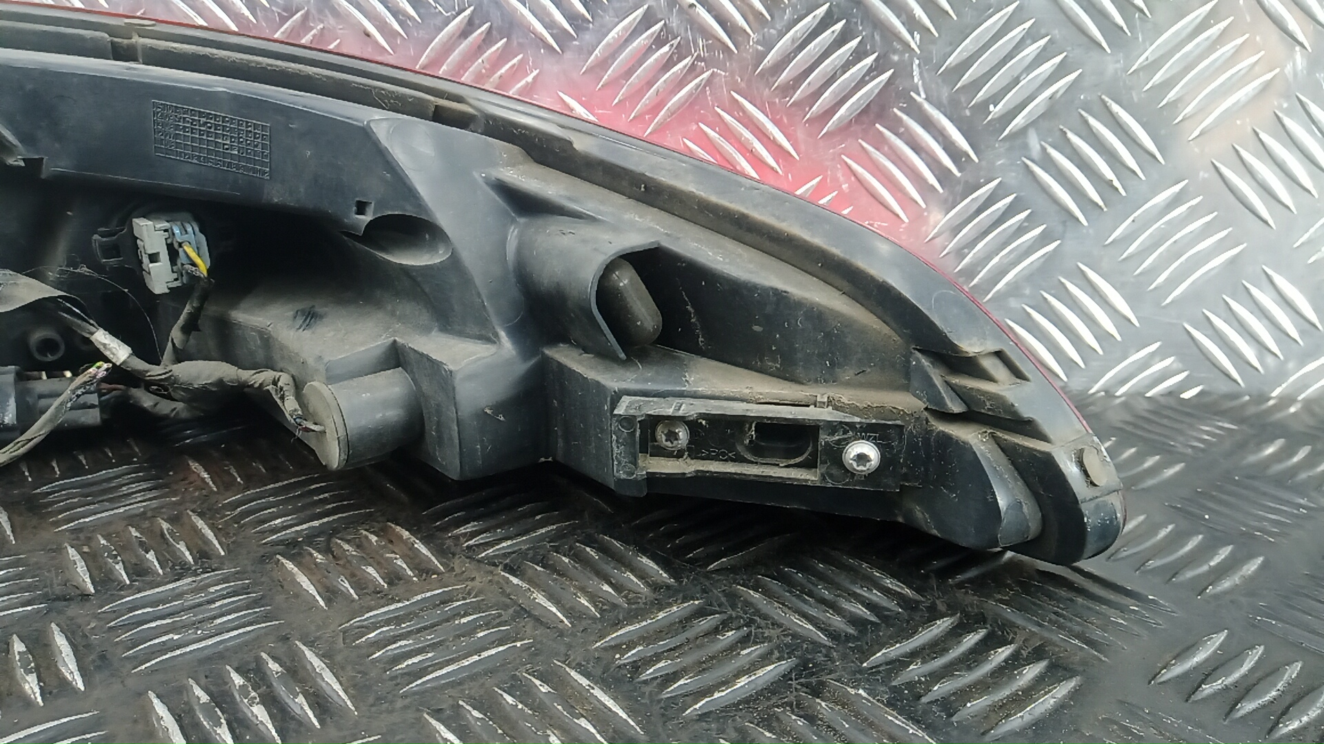 Фонарь задний левый