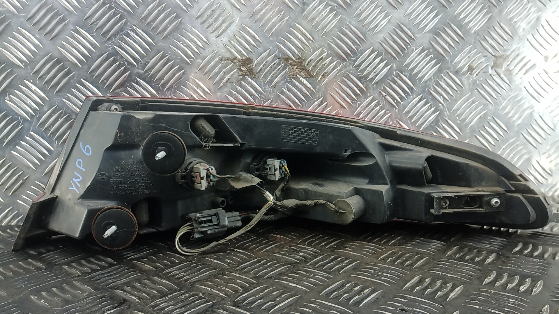 Фонарь задний левый