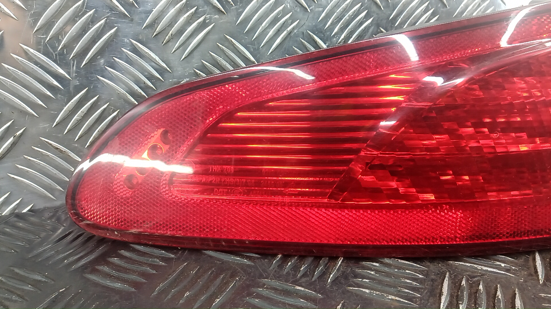 Фонарь задний левый