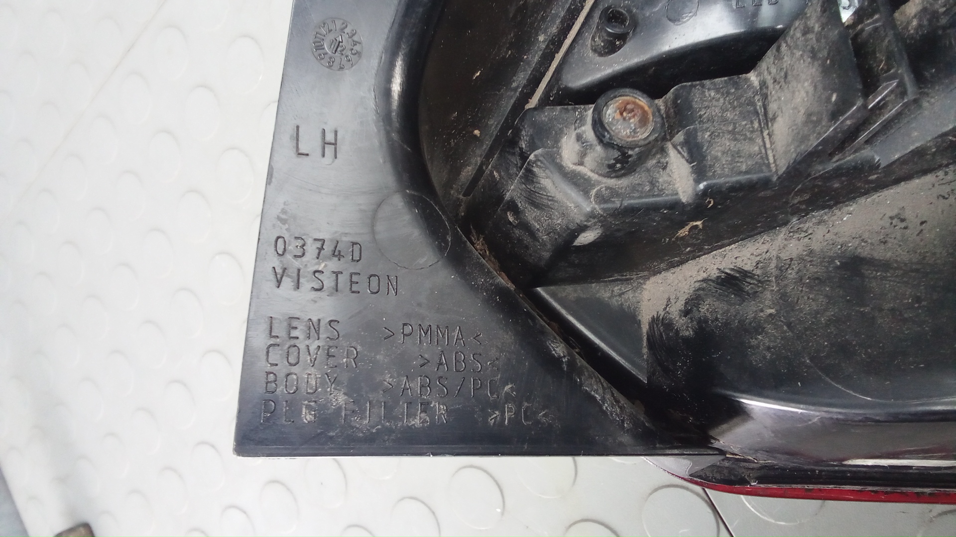 Фонарь задний левый