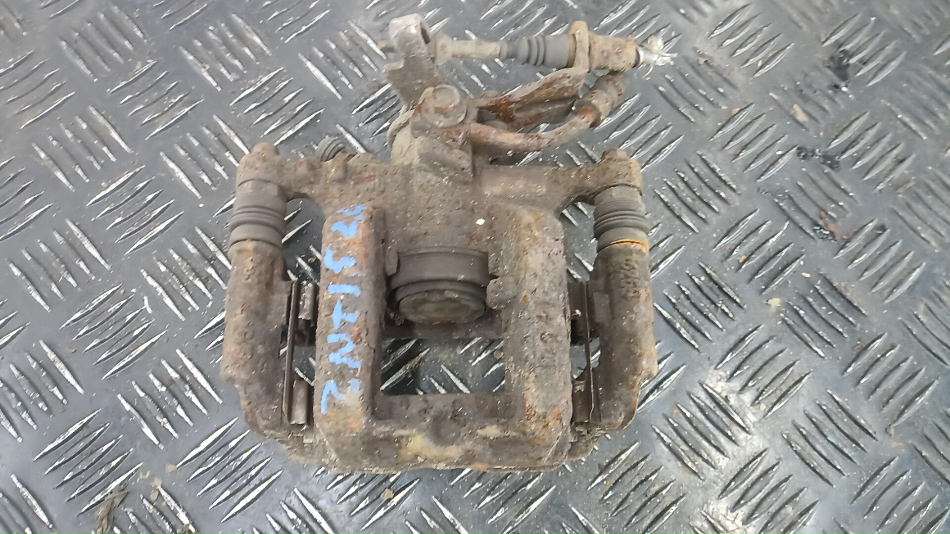 Суппорт задний левый