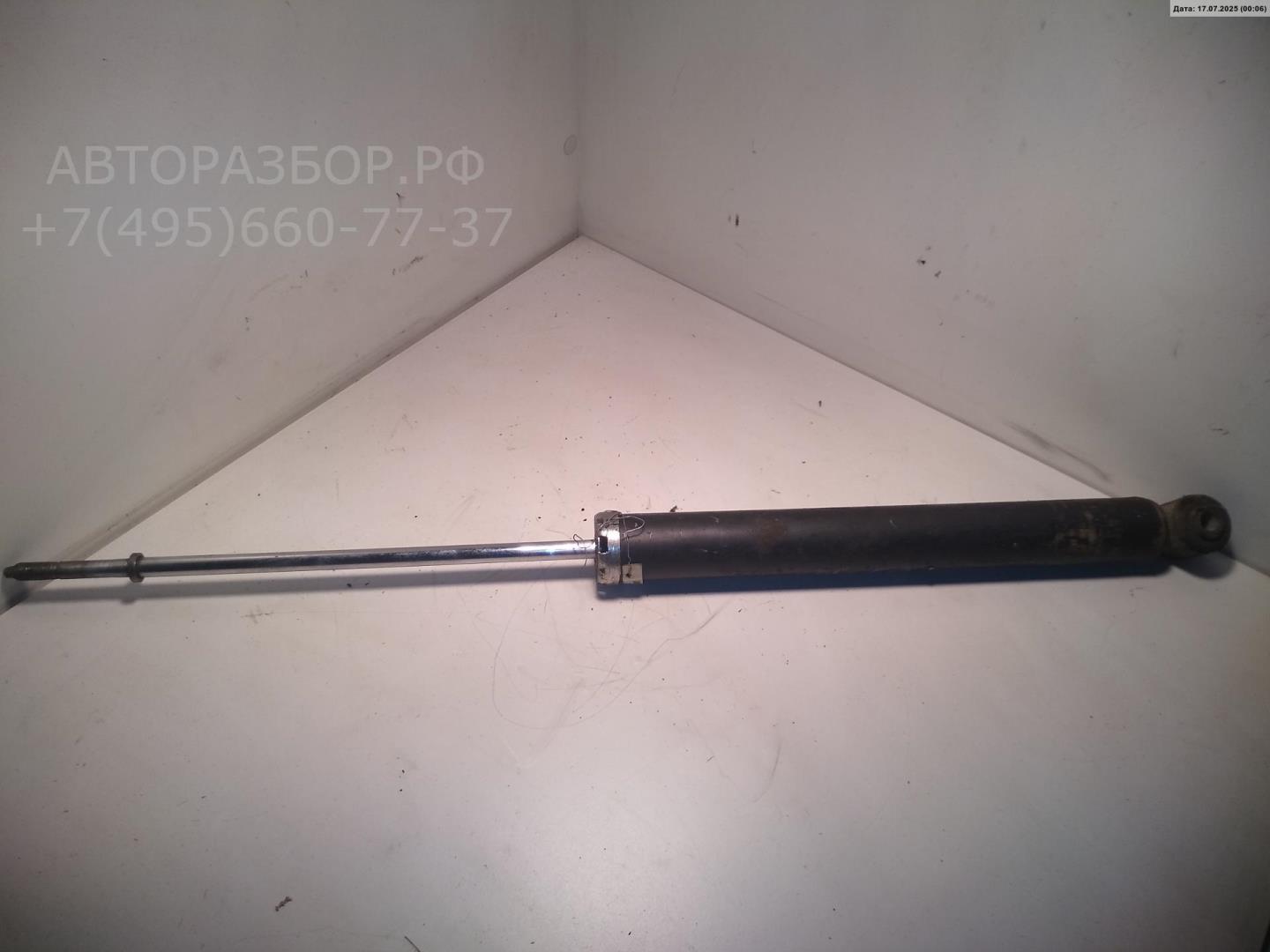 Амортизатор задний левый