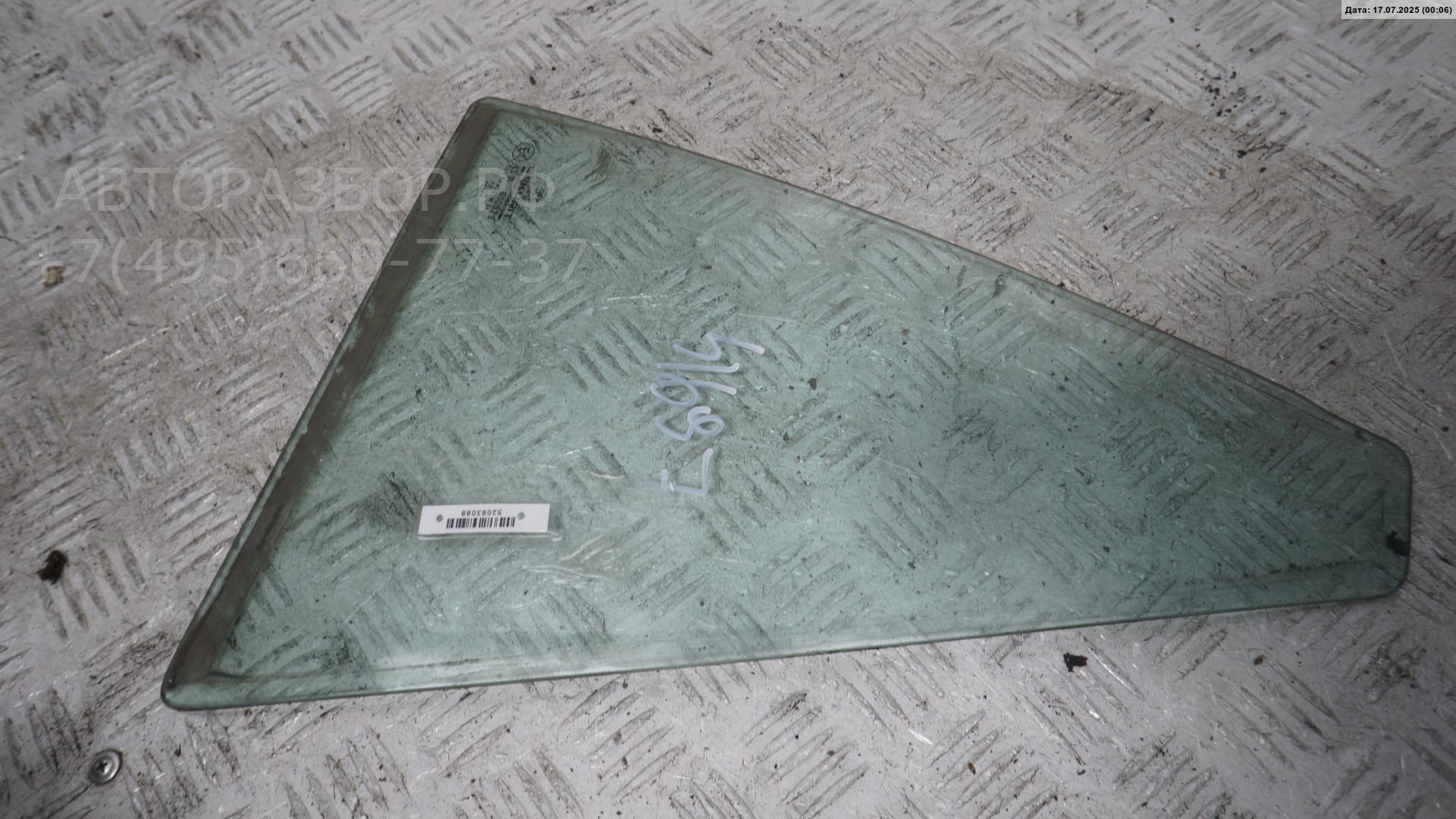 Стекло двери задней левой (форточка)