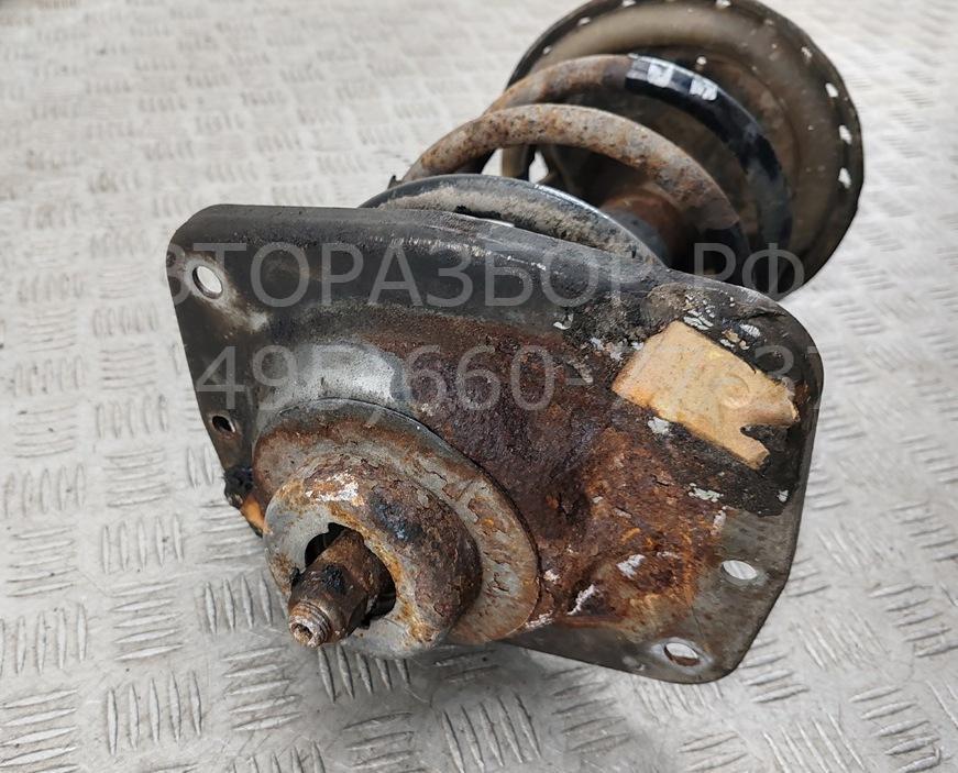 Амортизатор передний левый