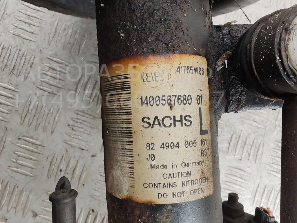 Амортизатор передний левый