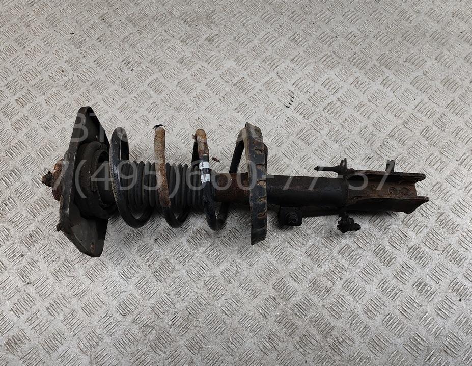 Амортизатор передний левый