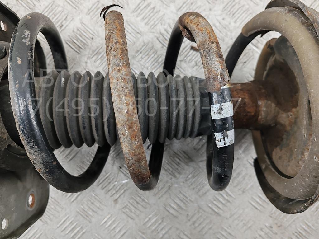 Амортизатор передний левый