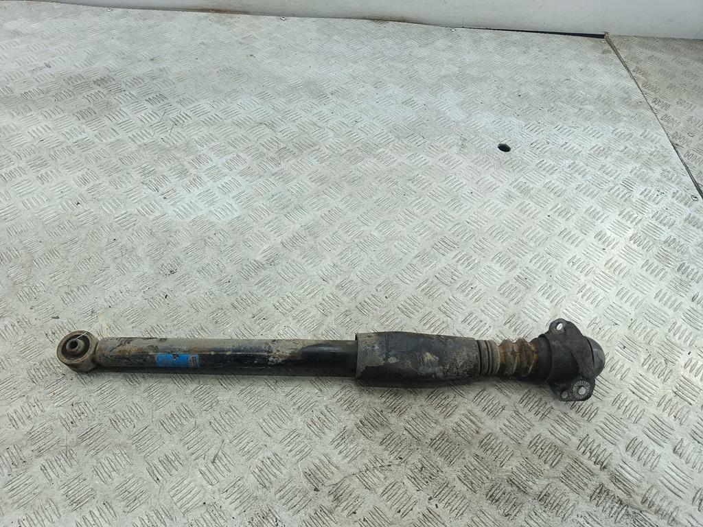 Амортизатор задний левый