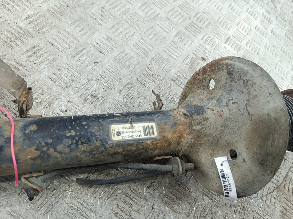 Амортизатор передний левый