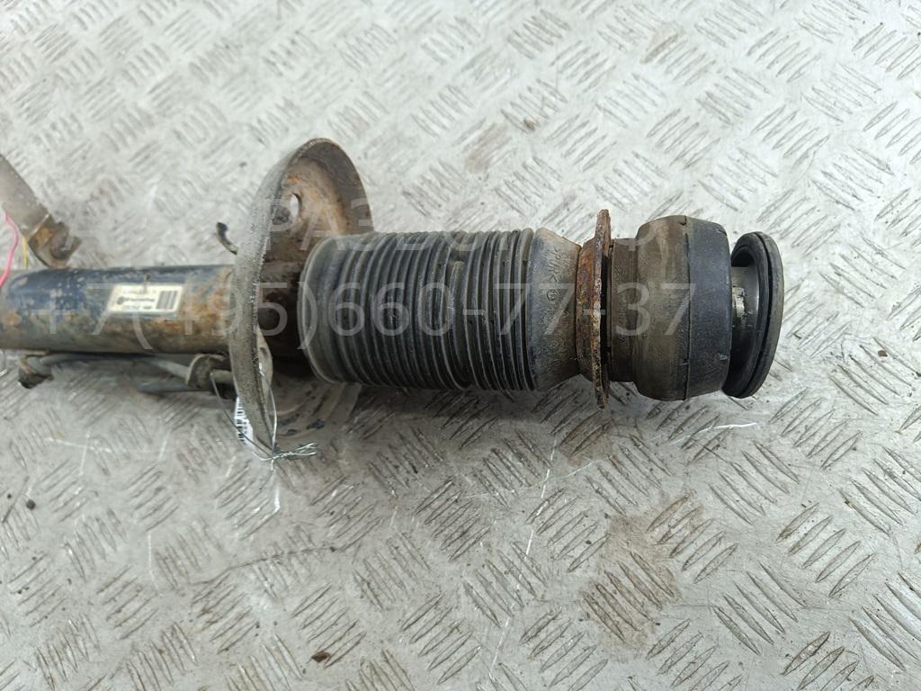 Амортизатор передний левый