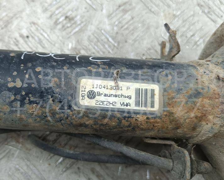 Амортизатор передний левый