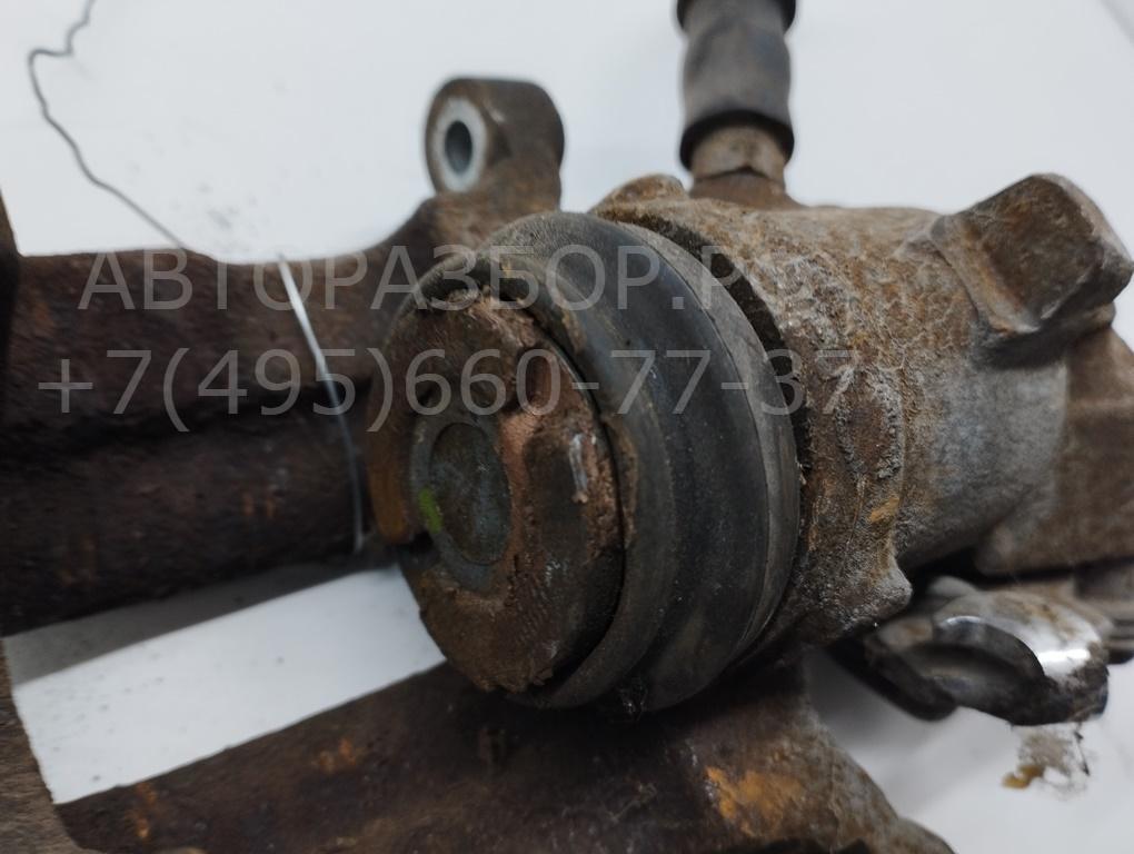 Суппорт задний левый