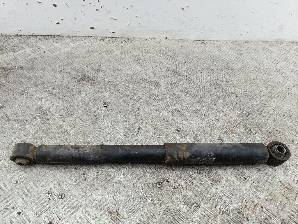 Амортизатор задний левый