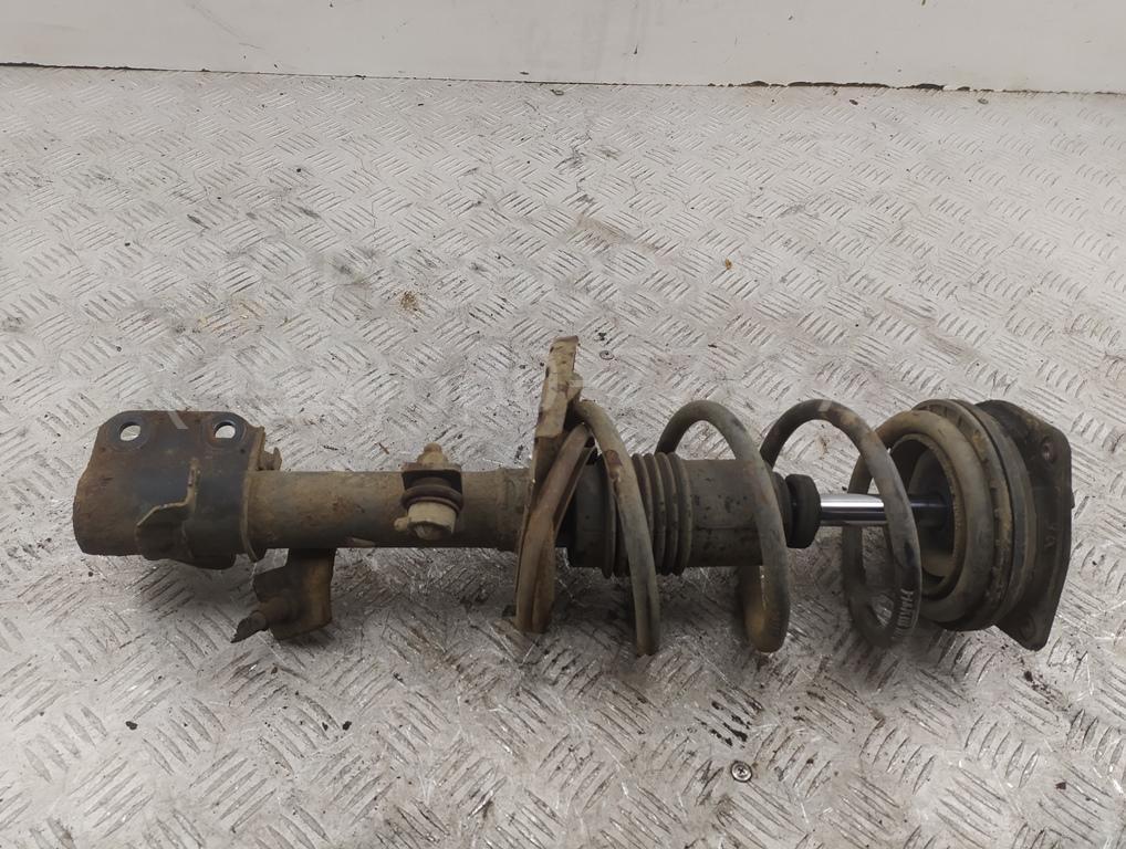 Амортизатор передний левый