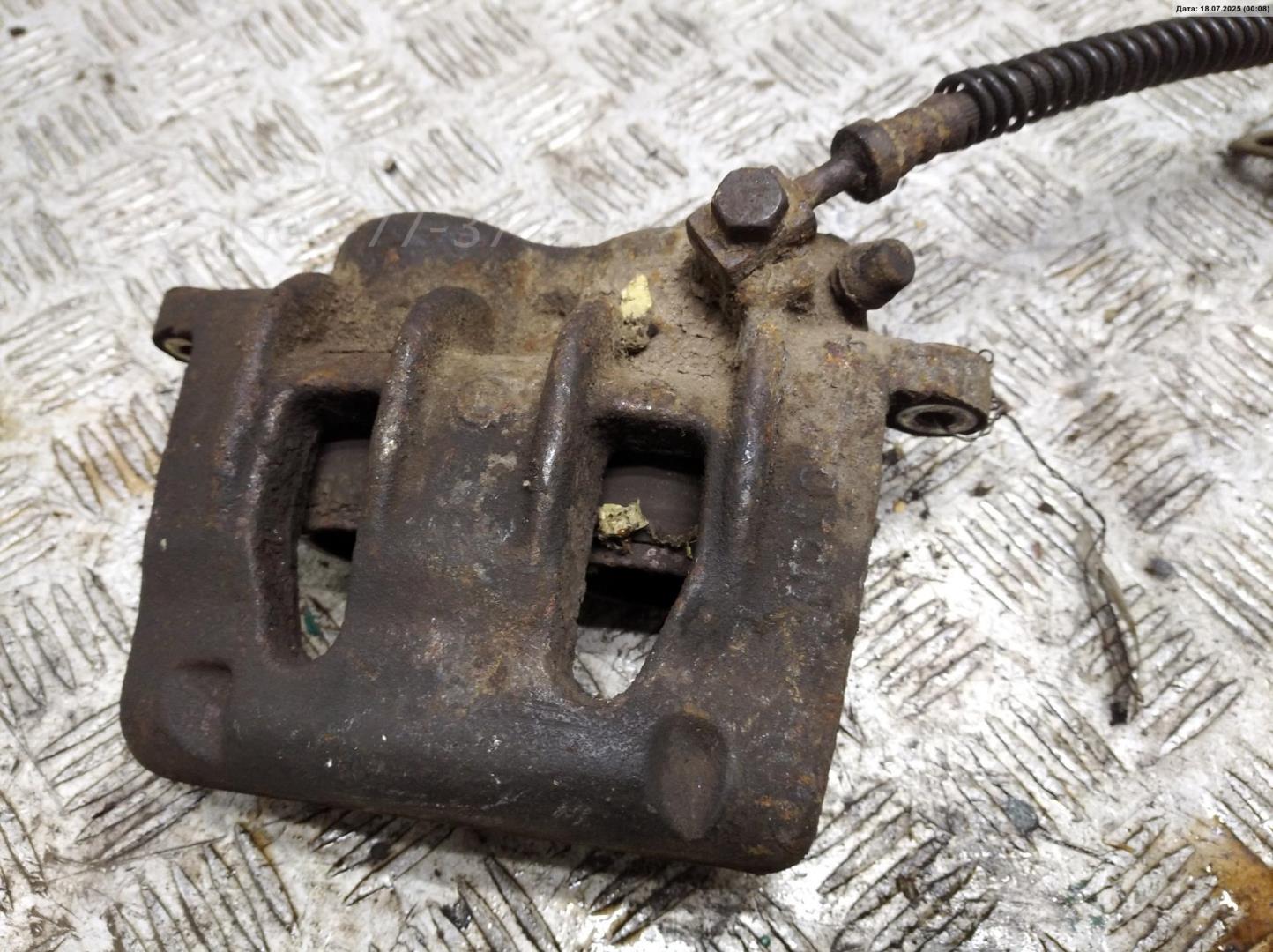 Суппорт передний левый